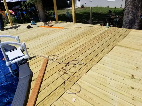 Pool deck build: laying the deck boards