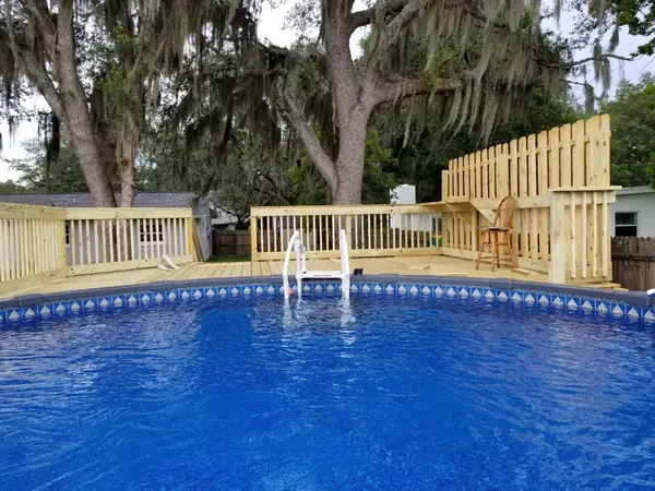 Finished pool deck with railings