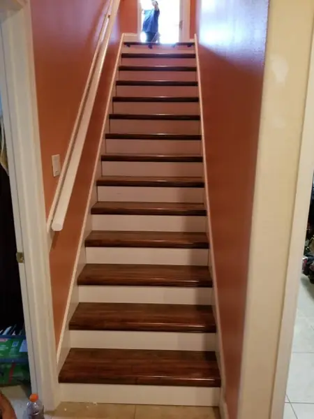 Staircase after new treads and painted risers