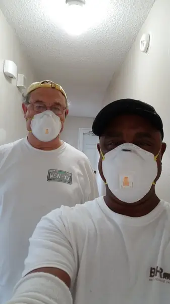 Crew prepping an interior for paint